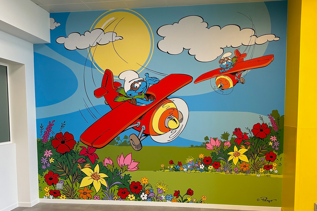 Muursticker De Smurfen kidscorner Brussels Airport